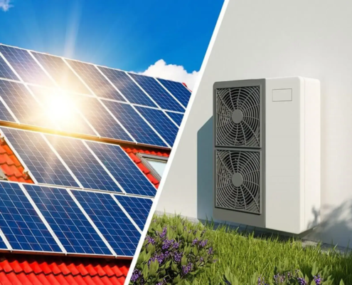 Dach eines Hauses mit Solarzellen und eine Außeneinheit einer Wärmepumpe neben dem Fenster eines Hauses